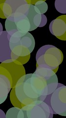Multicolored translucent circles on a dark background. Vertical image orientation. 3D illustration