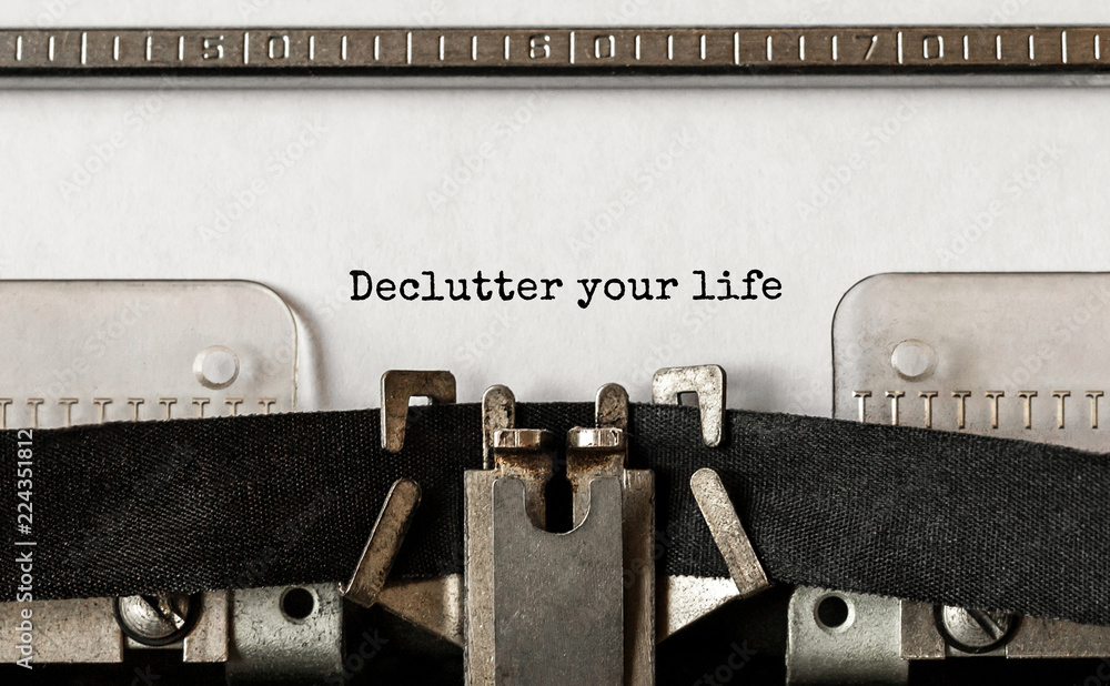 Poster text declutter your life typed on retro typewriter