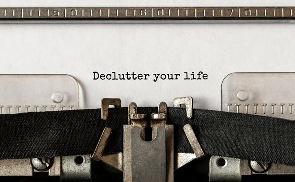 Text Declutter your life typed on retro typewriter