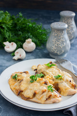 Chicken fillet breast with cheese and mushrooms, selective focus