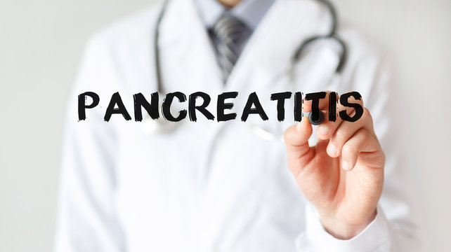 Doctor writing word Pancreatitis with marker, Medical concept