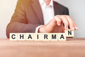 Man made word CHAIRMAN with wood blocks