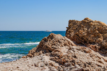 Fototapeta na wymiar Photo of a sea landscape with a rocky beach