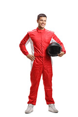 Racer standing and holding a helmet