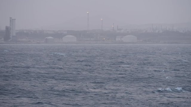 Petrochemical port in fog