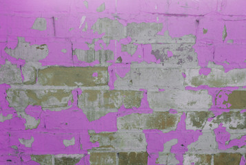 Brick wall with peeling paint