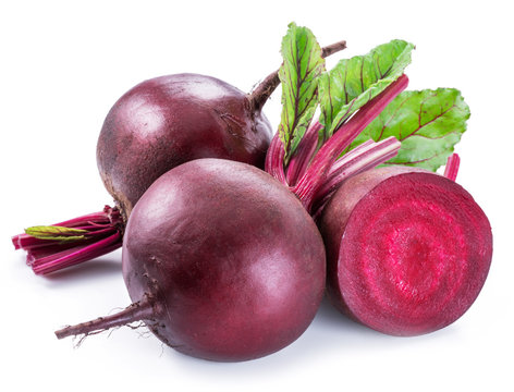 Red beets or beetroots on white background.