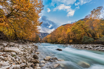 Old stone bridge in Klidonia Zagoria, Epirus, Western Greece. This arch bridge with elongated arch...