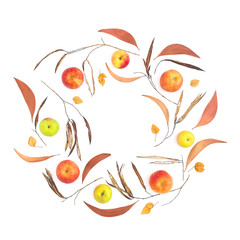 Autumn frame of fall leaves, apple fruits on white background. Flat lay, top view. Thanksgiving day composition