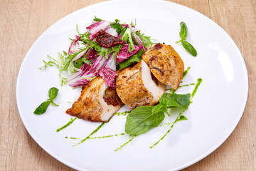 chicken breast with salad