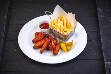 chicken wings and fries