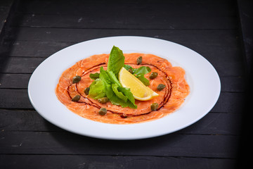 salmon carpaccio with lemon