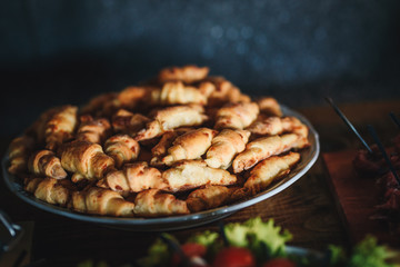 Mini croissants in a plate. 