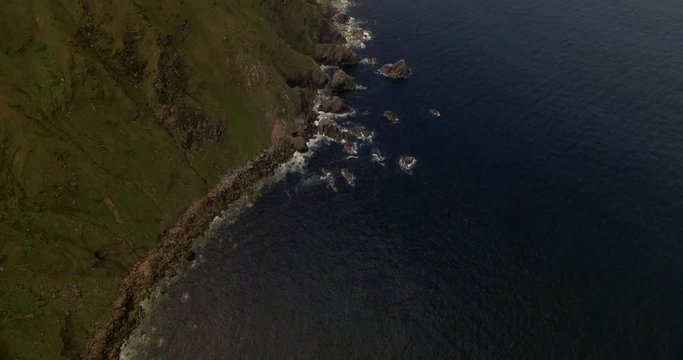 An aerial view of the steep rocky coast of Ireland.