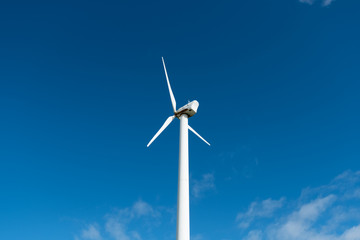 Wind Turbine Against a Clear Blue Sky