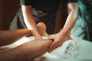 Obraz na płótnie Canvas Legs Sports Massage Therapy