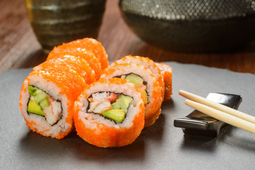 California sushi rolls and chopsticks