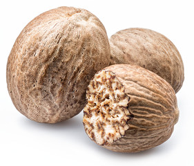 Dried seeds of fragrant nutmeg  isolated on white background.