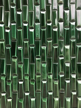 Green geometric tile wall background with room for text