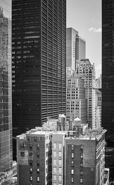 Black and white picture of old and modern New York City architecture, USA.