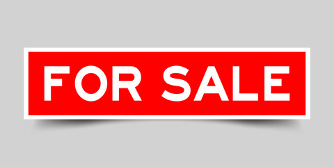 Red color sticker in word for sale on gray background