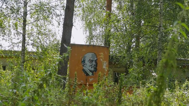 image of Lenin among a grassy area.
