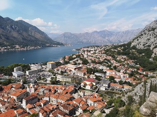 Naklejka na ściany i meble Stunning Scenic Views from Various Stages of Climb up the Castle of San Giovanni in Kotor Montenegro containing Blue Sea and Mountain Views