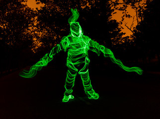 Man of light in the forest