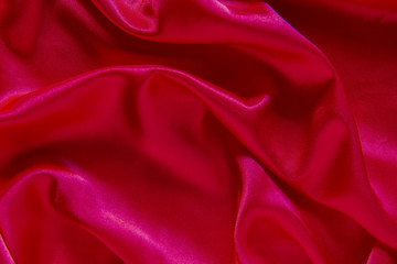 Plakat Red cloth waves background texture.