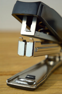 Black Stapler on the table close up Shallow Depth of Field