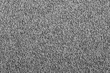Heather grey knitted fabric textured background