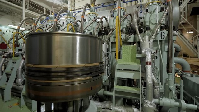 New piston near diesel engine of ship
