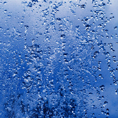Splashes of water in the fountain close up