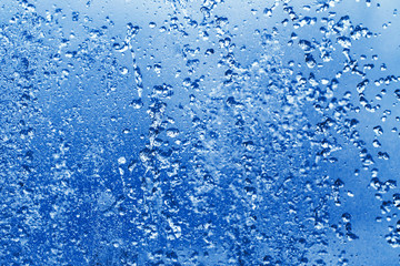 Splashes of water in the fountain close up