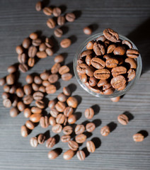 Coffee beans with glass bottle and sunlight