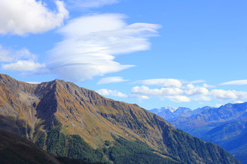 Obraz na płótnie Canvas mountain landscape and a panorama of clouds