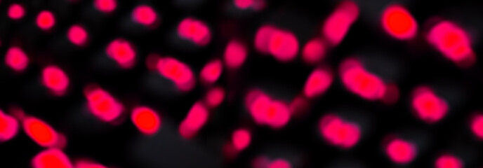 Night dark background bokeh, neon light, blurred background, light effect night view. Dark abstract background, laser glare.