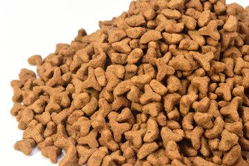 a pile of cat food on white background