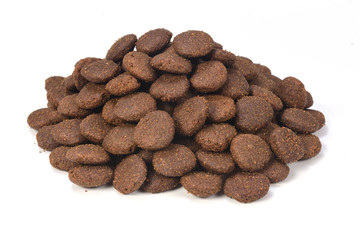 a pile of cat food on white background