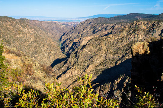 Long view of Black Canyon of the Gunnison National Park, including the Gunnison River, which carved this amazingly deep canyon in Colorado.