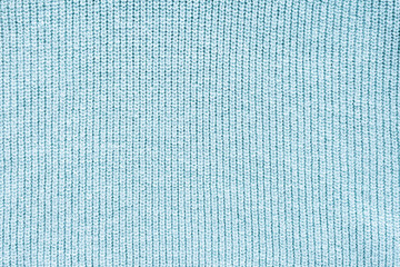 close up view of blue woolen cloth as background