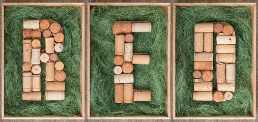 Word Red made of wine corks on green background in wooden box Seamless  Banner