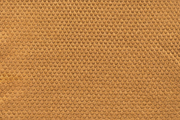 full frame of brown textured fabric as backdrop