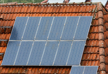 Roof of a house with a photovoltaic system