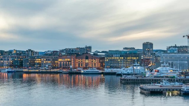 Oslo Norway time lapse 4K, city skyline day to night timelapse at harbour