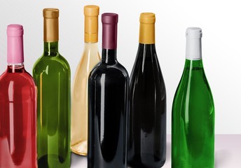 Various bottles of wine isolated on white