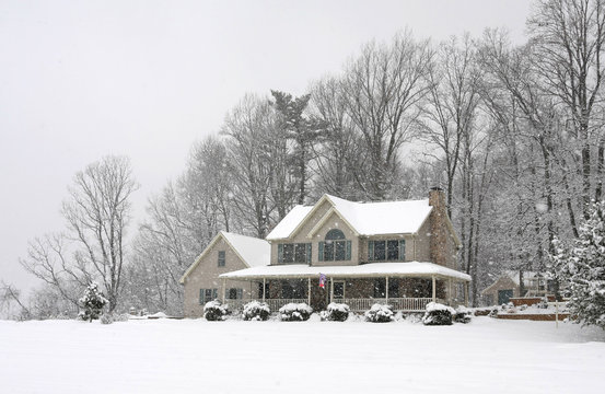 modern home in winter snow