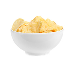 Bowl of tasty crispy potato chips on white background