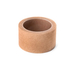 Medical sticking plaster roll on white background