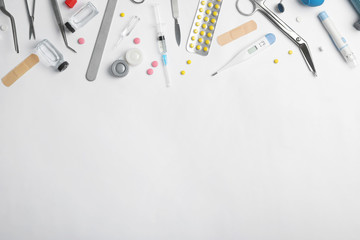 Composition with medical objects and space for text on white background, top view